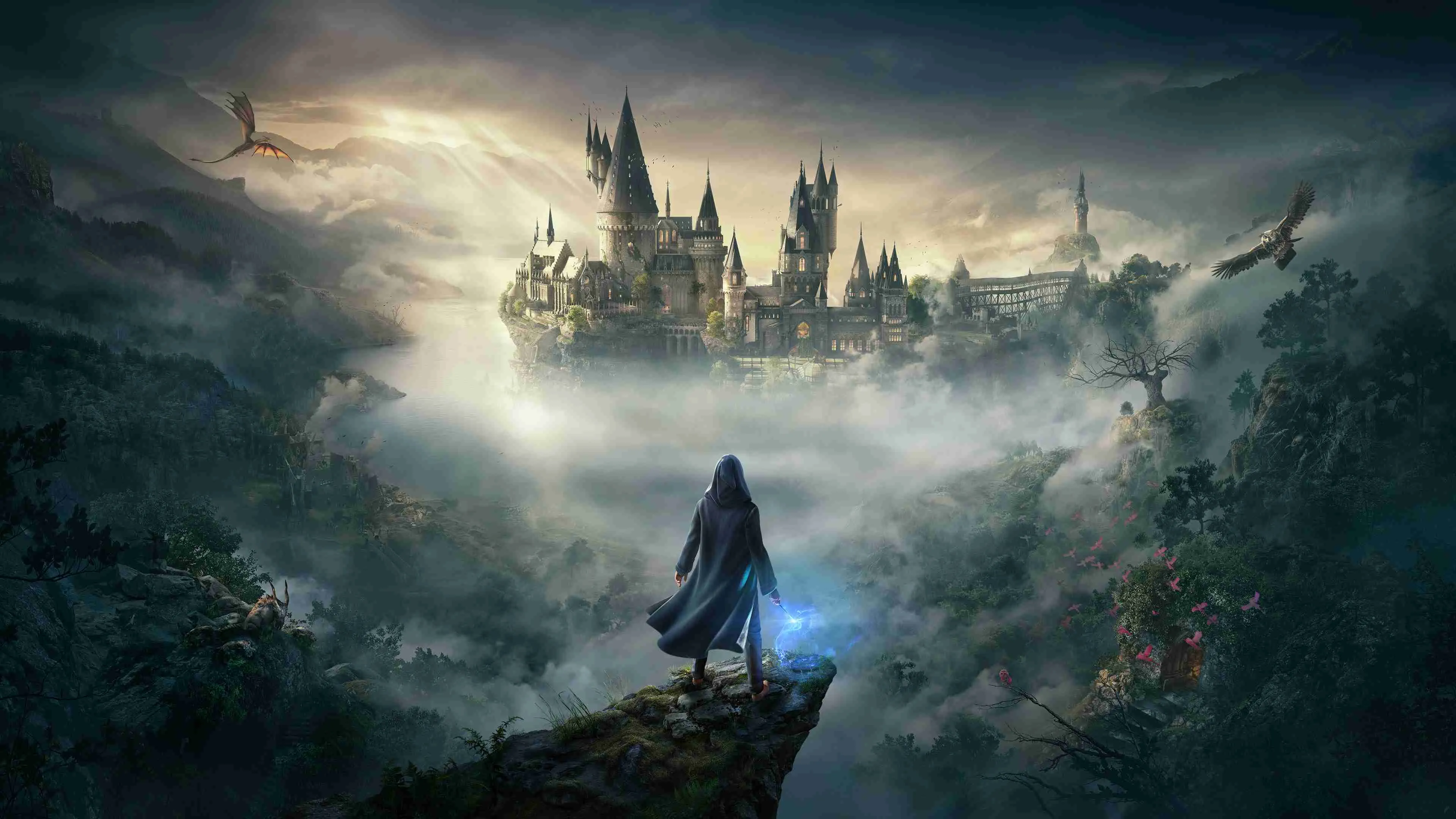 Hogwarts castle and its covered viaduct lit by low sun above a mist-filled valley and lake, seen from a clifftop in the foreground where a hooded figure stands with a blue-lit wand, a dragon flying at upper left and an eagle at upper right